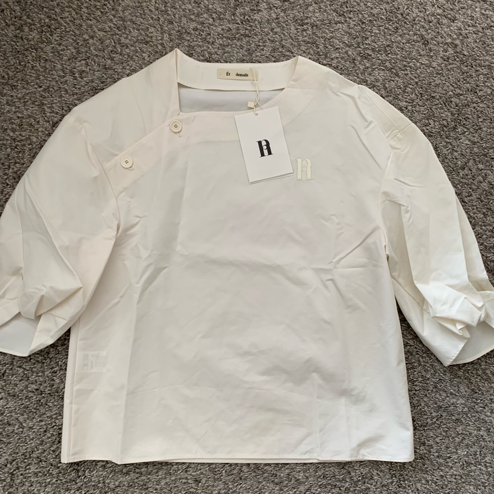 Et Demain Sleeve Twist Cream Button-Shoulder Blouse